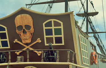 Image showing A fragment of the stern of a pleasure ship with a pirate logo.