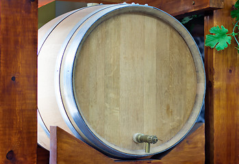 Image showing Wooden oak barrel wine,  with metal crane. .