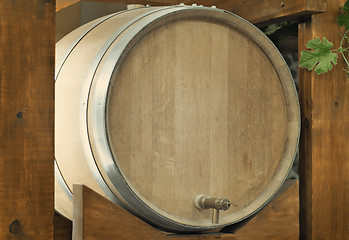 Image showing Wooden oak barrel wine,  with metal crane. .