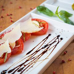 Image showing Fresh tomatoes, basil, garlic and parmesan cheese