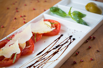 Image showing Fresh tomatoes, basil, garlic and parmesan cheese