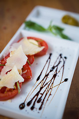 Image showing Fresh tomatoes, basil, garlic and parmesan cheese