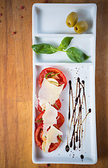 Image showing Fresh tomatoes, basil, garlic and parmesan cheese