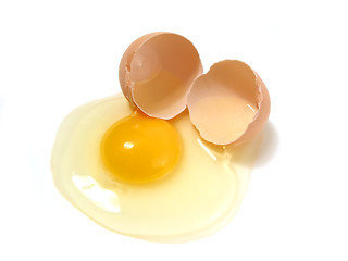 Image showing Broken egg on white