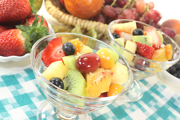 Image showing Fruit salad in a bowl on checkered napkin