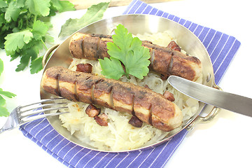 Image showing Brawurst with Sauerkraut and parsley