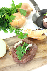 Image showing Ostrich steaks with smooth parsley