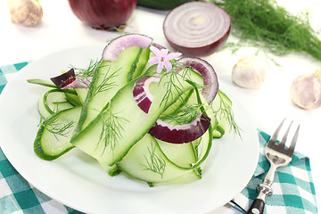 Image showing Cucumber salad with garlic flower