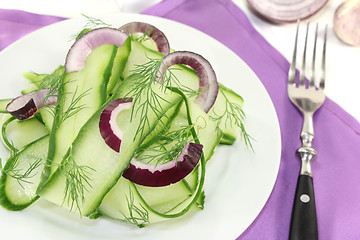 Image showing Cucumber salad with red onions and dill