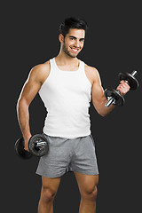 Image showing Athletic man lifting weights