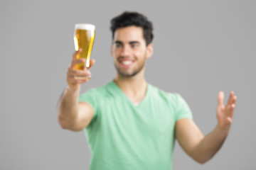 Image showing Young man drinking beer