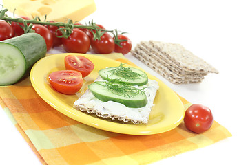 Image showing Crispbread with cream cheese and cucumber