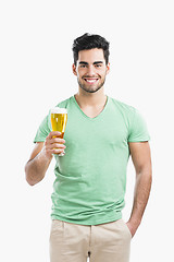 Image showing Young man drinking beer