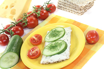 Image showing Crispbread with cream cheese, cucumber and dill