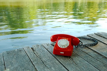 Image showing Old telephone in nature