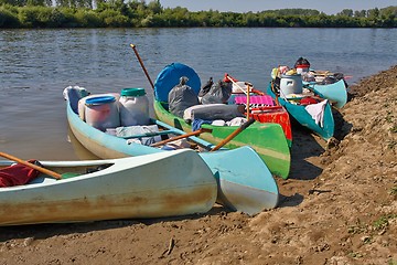 Image showing Canoes on the Riverside