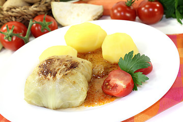 Image showing Stuffed cabbage with potatoes and gravy