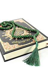 Image showing Quran with rosary