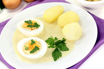 Image showing Mustard eggs with cooked potatoes