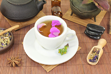 Image showing Chinese natural medicine with a cup of tea