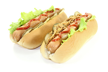 Image showing Hot dogs with ketchup and fried onions