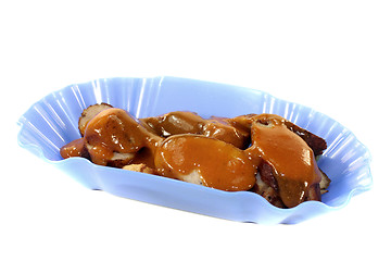 Image showing Currywurst with curry