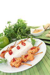 Image showing Asian sate skewers with chili