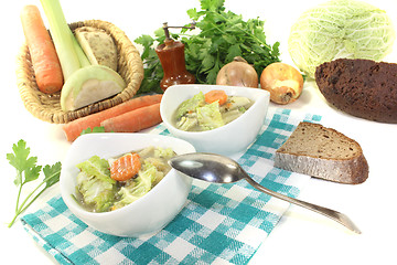 Image showing Savoy cabbage stew with carrots