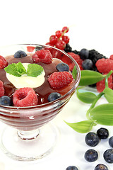 Image showing red fruit jelly with vanilla and lemon balm