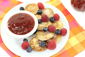 Image showing Dutch Poffertjes with berries
