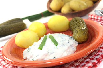 Image showing Potatoes with curd and pickles