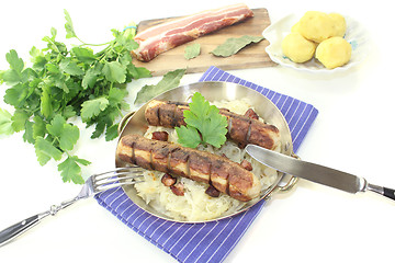 Image showing Brawurst with Sauerkraut and parsley