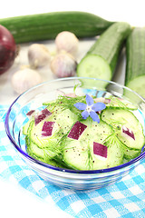 Image showing Cucumber salad with borage flower