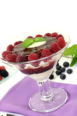 Image showing Layered dessert with blueberries and raspberries