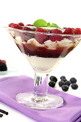Image showing Layered dessert with raspberries