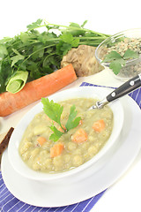 Image showing Pea soup with bread