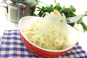 Image showing fresh Sauerkraut on a fork