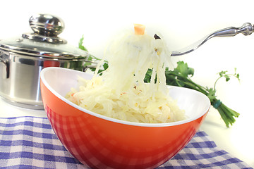 Image showing fresh delicious Sauerkraut on a fork