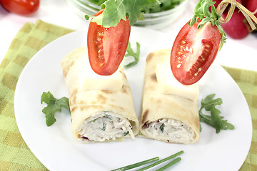 Image showing stuffed cheese crepe rolls with tomatoes