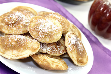 Image showing Poffertjes with powdered sugar and jelly