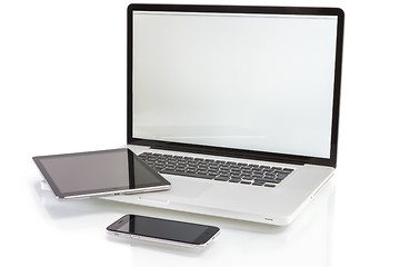 Image showing modern computer devices - laptop, tablet and phone