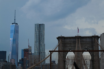 Image showing Crossing the bBrooklyn bridge before a storm