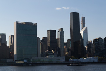 Image showing United nations by the river