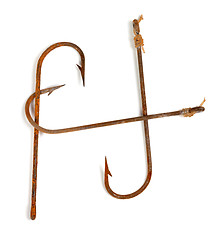 Image showing H-shaped old rusty fish hooks