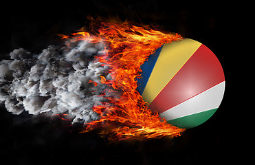 Image showing Flag with a trail of fire and smoke - Seychelles