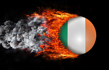 Image showing Flag with a trail of fire and smoke - Ireland