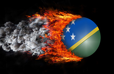 Image showing Flag with a trail of fire and smoke - Solomon Islands