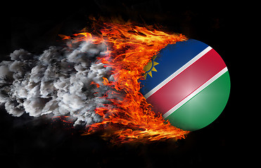 Image showing Flag with a trail of fire and smoke - Namibia