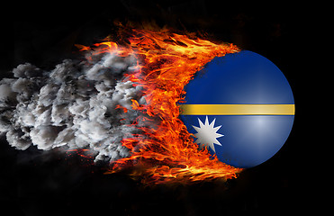 Image showing Flag with a trail of fire and smoke - Nauru