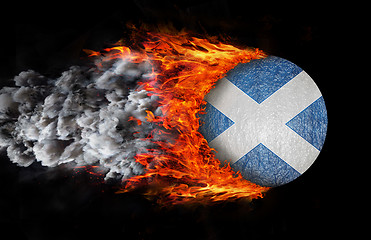 Image showing Flag with a trail of fire and smoke - Scotland